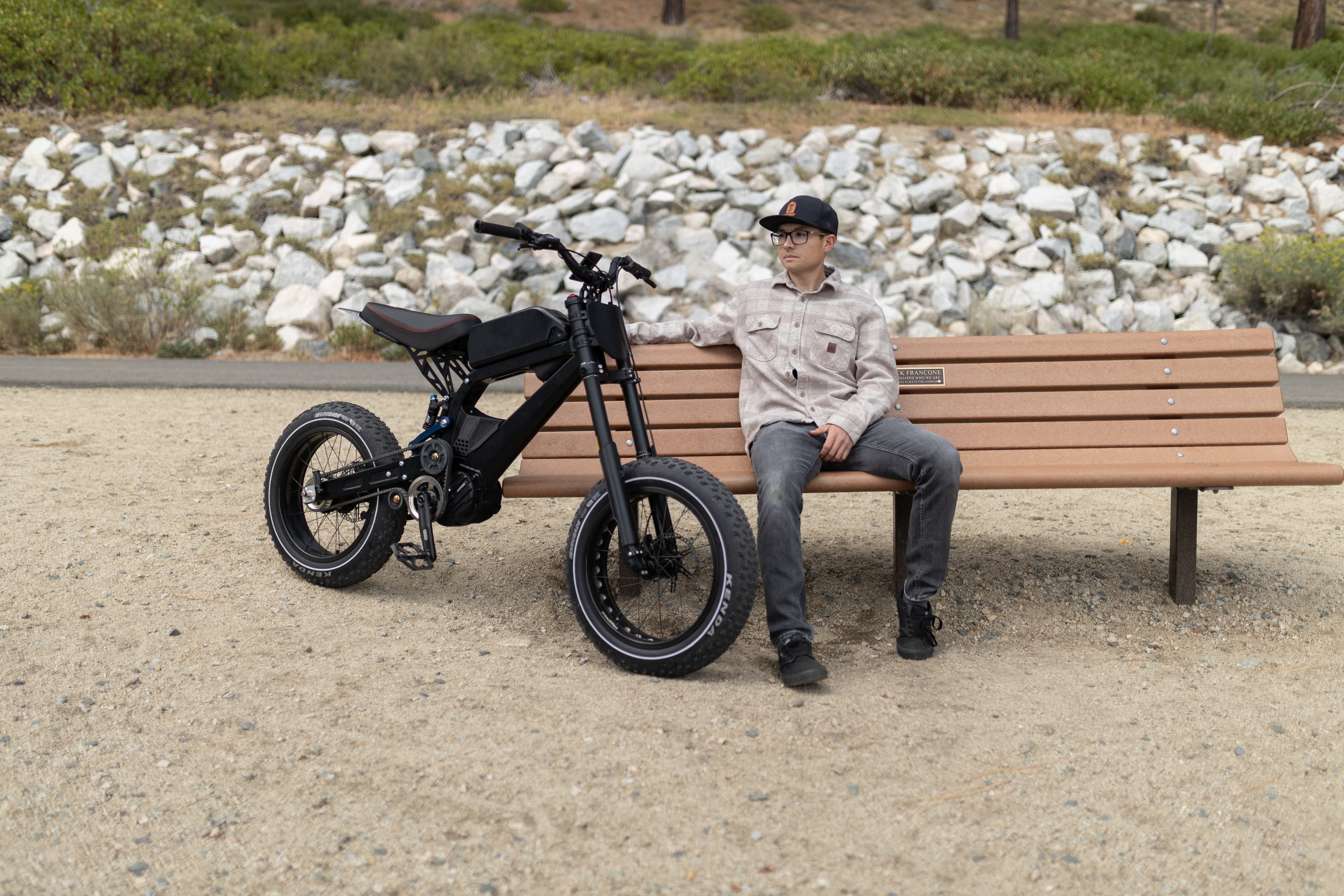 Rider beside a parked Surfline in Tahoe for the About page hero