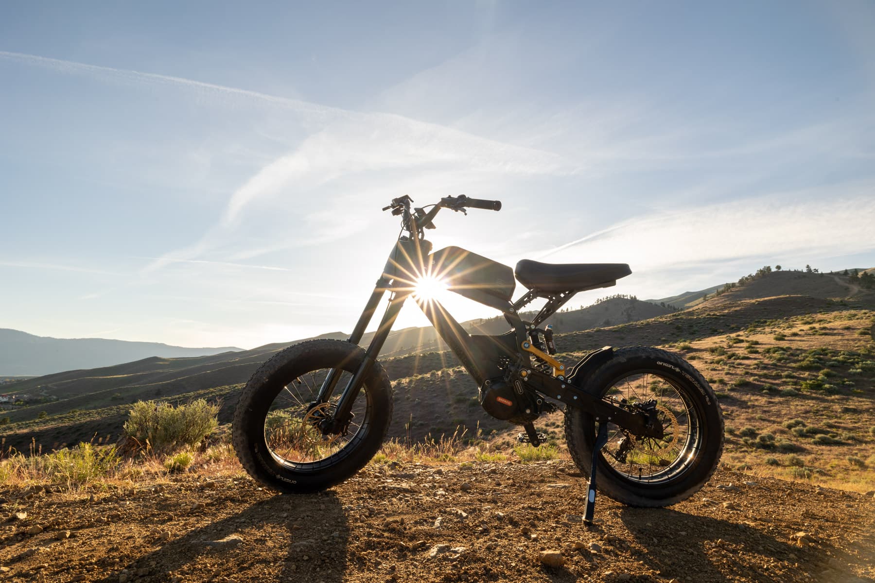 Surfline rider kicking up dust on a Peavine singletrack trail